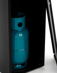 Blue gas cylinder inside a black cabinet fireplace