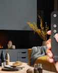 Remote-controlled Planika Cool Flame Pro water vapour fireplace in a contemporary setting. Smart home compatible, available at Spacio India.