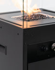 Close up of Planika's Faro outdoor gas fireplace with glass cover on a white background