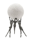 Statue of three figures lifting a large stone on a white background