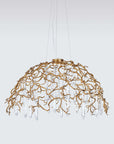 A Serip Aqua Chandelier, part of the Aqua Collection by Serip, with crystal drops hanging from it.
