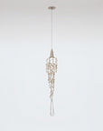 Pendant light fixture hanging against a plain background