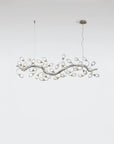 Chandelier with branch-like design on a white background