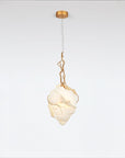 Pendant light with marble and gold finish metal fixture on a white background