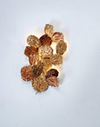 Decorative wall light with leaf design on a white background