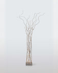 Decorative floor lamp of branches on a white background