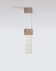 Modern pendant light with geometric design on a white background