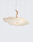 White pendant light with gold accents on a white background