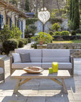 Sifas Coco collection of sofa seating with wooden coffee table at green exterior available at Spacio India for luxury home decor collection of Outdoor Furniture