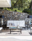 Sifas Cross collection of three Sofa seating with a chair, center table & decorative table lamps at exterior available at Spacio India for luxury home Outdoor Furniture decor collection