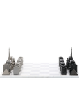 Skyline Chess set showcasing Paris landmarks with high-quality stainless steel chess pieces on a luxurious marble board, available at Spacio India.