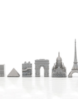 Close-up of Skyline Chess Steel Paris set with handcrafted stainless steel chess pieces representing iconic Paris monuments, available at Spacio India.