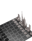 A luxury chess set with world-famous architectural icons, including Burj Khalifa and Sydney Opera House, on a Skyline Chess Steel World Icons Hatch Board.