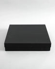 An elegant Skyline Chess Set gift box in black colour, blending architectural brilliance with strategic gameplay. Now at Spacio India.
