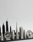 A close up of Luxury Skyline Chess Set, combining the essence of London and New York’s architectural heritage in an exquisite board game. Now available at Spacio India.