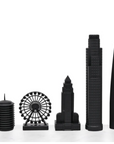 Premium chess pieces from the Skyline Chess Acrylic Los Angeles Map Board Set, inspired by iconic LA buildings, available at Spacio India.