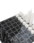 Black edition chess pieces from Skyline Chess Acrylic Los Angeles Map Board Set, featuring famous LA landmarks, available at Spacio India.