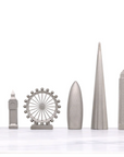 London skyline chess pieces in Skyline Chess Steel 2 City London New York Hatch Board, featuring Big Ben, London Eye, and The Shard, available at Spacio India.