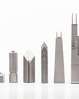 Chicago skyline chess pieces in Skyline Chess Steel 2 City San Francisco Chicago Hatch Board, featuring Willis Tower and John Hancock Center, available at Spacio India.