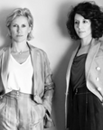 Two women standing next to each other in a black and white photo, wearing Affreschi Studio Milo Tailor Collection SM01 by Affreschi.