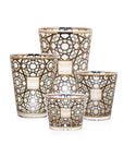 4 Candles in glass jars with text Baobab and Arabian nights on a white back ground.