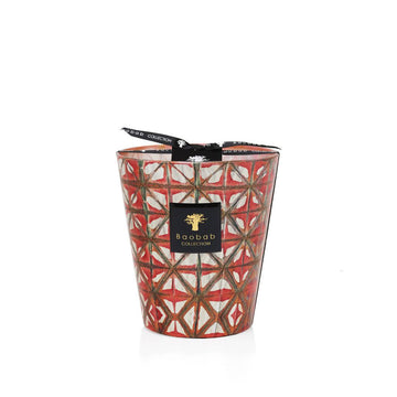 A Baobab Bohom Gyula Candle MAX16BGY, red and gold with a black handle, perfect for bringing a floral fragrance into your home.