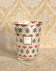A Baobab Damasse Candle Max 24 MAX24DAM with a red and gold pattern on it, reminiscent of Italian palaces.