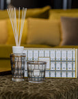A Baobab Roma fragrance diffuser elegantly placed on a table, accompanied by a gift box.