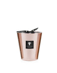 A Baobab Roseum Candle MAX16ROS with a rose gold hue and a black lid, exuding femininity.
