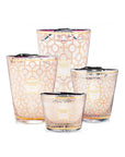 A set of three Baobab Women Candle Max 10 MAX10WOM glass candle holders with a breast cancer research pattern on them.