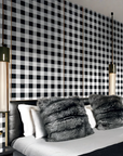 A bedroom with a Londonart Dsquared2 D2Jack DSQ2W02 wall inspired by Italian tailoring.