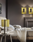 A bedroom with two Masiero Ebe Table Lamps, from the Masiero Ebe Collection, featuring exquisite designs inspired by precious stones.