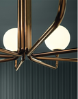 A Masiero Tee Table Lamp, a luxury lighting fixture featuring a metal frame and a glass ball.