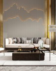 A luxuriously furnished living room with gold accents and decorative lighting inspired by Masiero Vegas Chandelier lights.