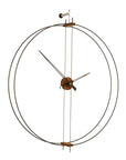 A Clock Nomon Barcelona BAR with a natural walnut wood frame and minimalist design.