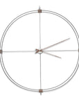 A Nomon wall clock with a circular shape on a white background, perfect for interior decoration.