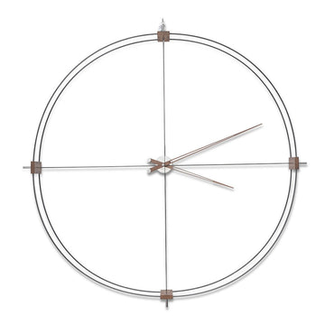 A Nomon wall clock with a circular shape on a white background, perfect for interior decoration.