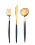 Cutipol Goa blue matt gold finish, black resin handles, and minimalist design for a luxurious dining experience - on a white background 3pc table set of fork, knife and spoon