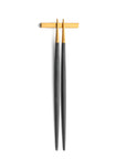 Cutipol Goa grey matt celadon finish, black resin handles, and minimalist design for a luxurious dining experience - on a white background chopsticks on pillow