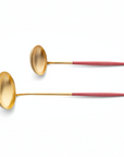 Cutipol Goa red matt gold finish, black resin handles, and minimalist design for a luxurious dining experience - on a white background 2 pc spoon servers