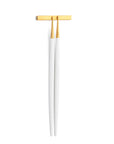 Cutipol Goa white matt gold finish, black resin handles, and minimalist design for a luxurious dining experience - on a white background chopsticks with servers