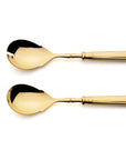 Cutipol Line Collection featuring ribbed steel and a sleek design, crafted in Portugal, perfect for luxury dining experiences - salad servers in polished gold