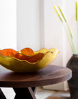 A pair of Gardeco Mapa bowls on a wooden side table styled by Navin Kanodia of Spacio Mumbai in a luxury living room