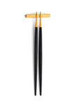 Cutipol Goa black matt gold finish, black resin handles, and minimalist design for a luxurious dining experience - chopsticks rest pillow