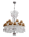 Chanel Collection chandelier by Italamp with carved crystal, chrome-finished metal, and dove fabric diffusers, showcasing Italian luxury and timeless design. A Chanel chandelier on a white background