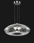 A pendant light showing details of the design on a white background. Cicla collection by Italamp, featuring handmade Balloton glass lamps in transparent, white, and smoked finishes with grooved Vicenza stone bases and metal accents.