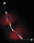 Colier collection by Italamp, featuring modular blown glass elements in vibrant colours and shapes, designed by Marc Sadler to create magical lighting effects. A red color wall sconce on a black wall.