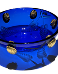 A stunning Mario Cioni Purpose Blue Gold Walnut Crystal Bowl with deep blue crystal, gold walnut accents, and intricate engraved leaf patterns, handcrafted in Italy.