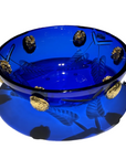 A stunning Mario Cioni Purpose Blue Gold Walnut Crystal Bowl with deep blue crystal, gold walnut accents, and intricate engraved leaf patterns, handcrafted in Italy.