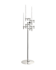 A polished silver metal candelabra with a tall central stem, multiple branching arms, and four long taper candles, shown on a plain white background.